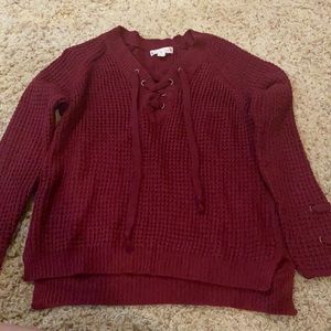Burgundy Women’s knit sweater .